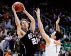 THE SWEET 16: Gordon Hayward takes a shot over Syracuse's Andy Rautins. Early on in the game, Butler already has a commanding lead over the Orange.