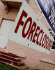  

MIAMI - SEPTEMBER 18:  A foreclosure sign hangs in front of a home September 18, 2007 in Miami, Florida. According to August numbers released by RealtyTrac, delinquencies and defaults more than doubled versus August 2006 and jumped 36 percent from July. The number is the highest number of foreclosure filings reported in a single month since the company began tracking monthly filings two years ago.  (Photo by Joe Raedle/Getty Images)
 
