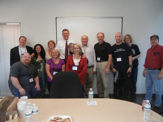 Rep. Paulsen visits with employees at Walman Optical in Brooklyn Park, MN.