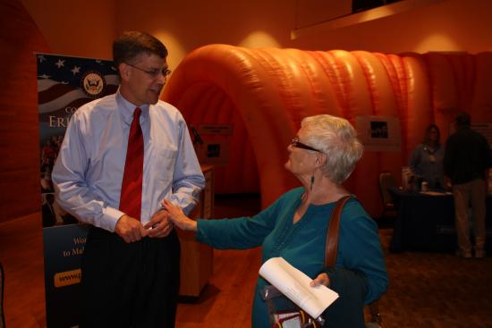 Rep. Paulsen speaks with neighbors during recent Seniors Fair