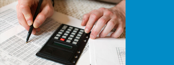 Man using calculator