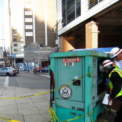 Photo: Honolulu District's Power PRT Quality Assurance representative Joe Tribbey and Logistics Specialist Laureen Vizcarra checking a 25kw FEMA owned generator installed for the West Street Underpass sump pumps in New York City.