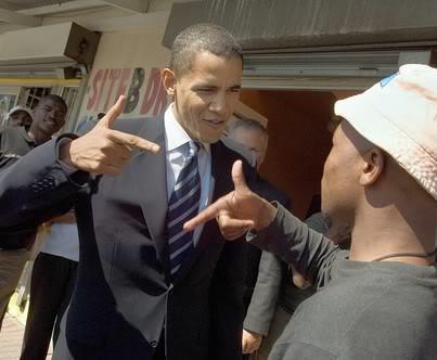 Photo: Two fellas here gesturing the gangsta' hand symbol for executing someone "gangland" style -- photo from the 2012 campaign trail -- reaching out to his electorate. More:

http://www.freerepublic.com/focus/f-chat/2940442/posts

**Join us at Conservative Patriots of America -- here on facebook @: https://www.facebook.com/ConservativePatriotsofAmerica