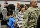 South Carolina Gov. Nikki Haley, left, comforts her son, Nalin, 10, and her daughter, Rena, 14, as her husband, Capt. Michael Haley, right, gets ready for a deployment ceremony for the South Carolina Army National Guard 3/49 Agribusiness Development Team at McCrady Training Center, Thursday, Jan. 10, 2013, at Ft. Jackson, S.C. The deployment is scheduled for a year including one month of training in Indiana prior to leaving for Afghanistan.