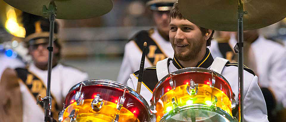 Sound of Idaho drumline captain Mat Schaefer plays the Band-Beesten