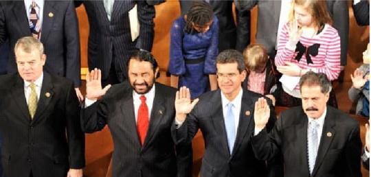 Photo: Taking the oath of office for the 113th congress with my colleagues—from left to right- 
Mike McIntyre from the 7th district of North Carolina, Al Green from the 9th district of Texas and Pedro Pierluisi from Puerto Rico.
-----------------------------------------------------------------------------
Durante la juramentacion al nuevo congreso con mis colegas, Mike McIntyre de North Carolina, Al Green de Texas y Pedro Pierluisi de Puerto Rico