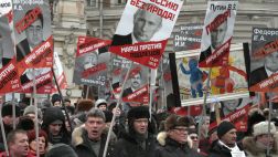 Thousands marched through Moscow on Sunday to protest Russia's new law banning Americans from adopting Russian children, a far bigger number than expected in a sign that outrage over the ban has breathed some life into the dispirited anti-Kremlin opposition movement.