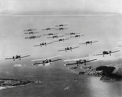 From the Mid-Week Pictorial: “San Francisco Sees a War in the Air” read the caption for this image of bombers performing maneuvers above the city. Aug. 10, 1930. Photo: The New York Times 