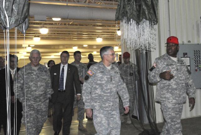 Chief Warrant Officer Cortez Frazier, U.S. Army Quartermaster School, Aerial Delivery and Field Services Department deputy chief, explains elements of the parachute packing process to Army Chief of Staff General George W. Casey Jr.; Maj. Gen. James E. Chambers, Combined Arms Support Command, Sustainment Center of Excellence and Fort Lee commanding general and William F. Moore, CASCOM, SCoE deputy to the commanding general, during a visit to the facility. Casey visited Fort Lee, Va., Jan. 28 touring many of the installation's newest facilities.