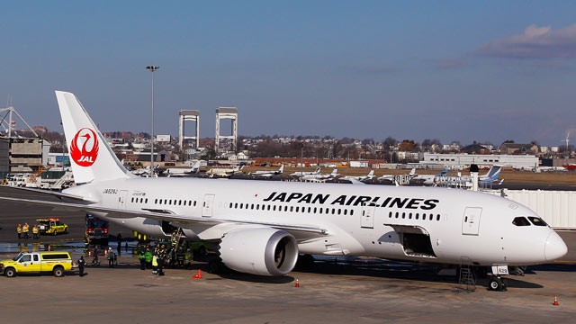 PHOTO: A Japan Airlines Boeing 787 Dreamliner jet aircraft is surrounded by emergency vehicles while parked at a terminal E gate at Logan International Airport in Boston, Jan. 7, 2013.