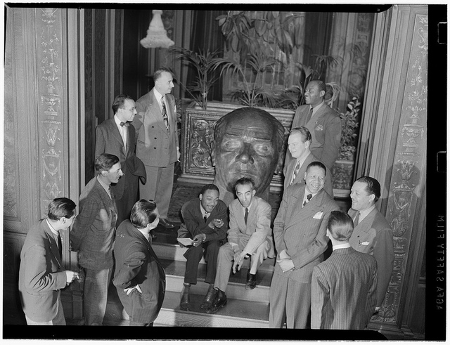 [Portrait of Nesuhi Ertegun, Herb Abramson, Ahmet M. Ertegun, Mezz Mezzrow, Jay Higginbotham(?), Art Hodes, Lou McGarity, Henry Allen, Lester Young, and Sadi Coylin(?), Turkish Embassy, Washington, D.C., ca. 1940] (LOC)