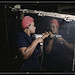 Operating a hand drill at Vultee-Nashville, woman is working on a "Vengeance" dive bomber, Tennessee  (LOC)