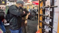 Gun show opens as debate roils - Photo