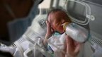 Feeding a baby in China