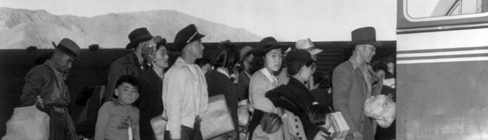 Japanese-Americans transferring from train to bus