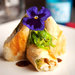 A crispy lobster wrap with mango and bean sprouts.