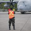 Philippine service members, U.S. Marines off-load supplies in Davao [Image 1 of 16]