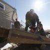 Marines move debris for residents [Image 3 of 4]