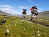 Photo: Men hike along the Kungsleden Trail in Sweden