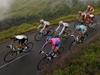 Photo: Cyclists bike down the Massiac pass during the 9th stage of the Tour de France 2011