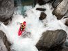 Photo: Kayaker Ben Brown navigates through rocks on the Kokatahi River, New Zealand.