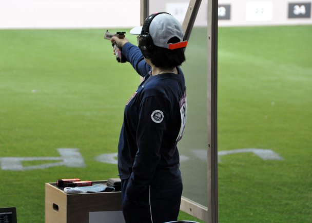 Navy Reserve Petty Officer 1st Class Sandra Uptagrafft competes in women's 25-meter sport pistol, Aug. 1, 2012, at the Royal Artillery Barracks in London. Uptagrafft finished in 28th place, the same result she had in her first event, air pistol, July 29. She now turns her attention to cheering on husband Sgt. 1st Class Eric Uptagrafft, U.S. Army Marksmanship Unit, who will compete in the men's rifle prone event  Aug. 3.