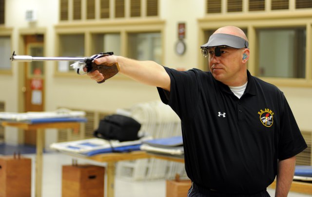 U.S. Army World Class Athlete Program pistol shooter Sgt. 1st Class Daryl Szarenski, seen here practicing at the U.S. Olympic Training Center in Colorado Springs, Colo, will compete July 28, 2012, in the Olympic 10-meter air pistol event and Aug. 5, 2012, in the 50-meter free pistol, his stronger event, at the Royal Artillery Barracks in London.