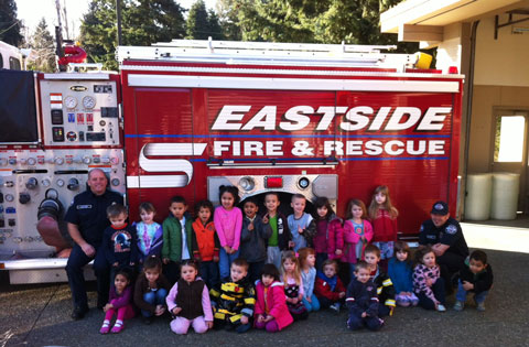 Liberty preschool students visit  their fireman friends