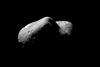 Eros, looking from one end of the asteroid across the gouge on its underside and toward the opposite end