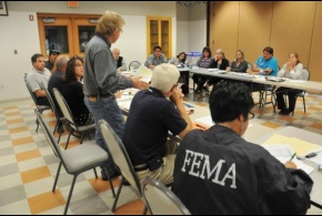 FEMA staff present information regarding FEMA's public assistance program to members of the Fond du Lac Band of the Lake Superior Chippewa. (August 2012)
