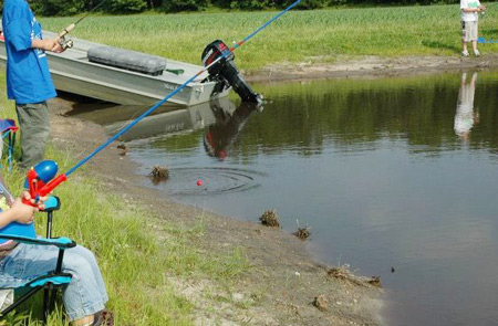 A family fishing on the shore