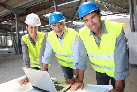 Assess your risk - Three Architects at construction site work table