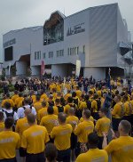 CPOs wearing yellow t-shirts stand infront of  HRNM for heritage training