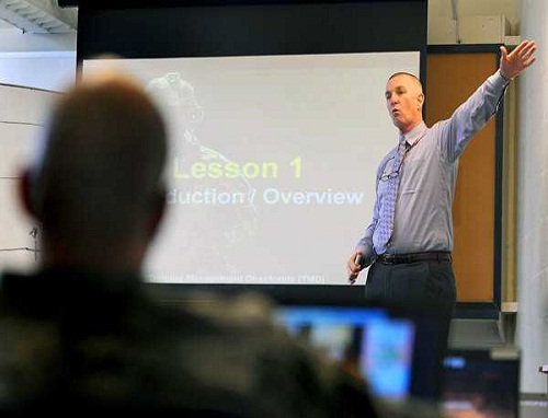 Instructor Jimmy Davis, of the Combined Arms Center-Training Division at Fort Leavenworth, Kan., conducts a recent training management course for JBLM Soldiers and civilians.