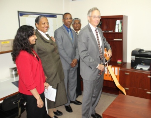 Ambassador Anania cuts the ribbon at new forensics lab- Photo by: State Dept.