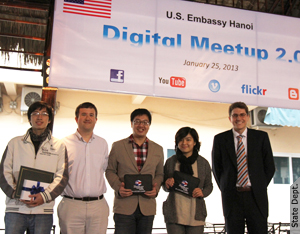 Public Affairs Officer Chris Hodges (second from the left) and Press Attaché Spencer Cryder (on the right) with the winners of the video contest "Vietnam: My Voice, My Video".