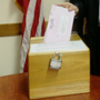 Deputy Public Affairs Officer Michael Turner cast his 2012 U.S. election absentee ballot.