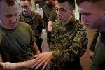 Navy Petty Officer 2nd Class Michael Pappas, one of three Navy corpsmen stationed at Marine Barracks Washington, taught the Combat Lifesaver Course to 30 Marines on Jan. 31. 