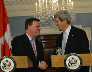 U.S. Secretary of State John Kerry shakes hands with Canadian Foreign Minister John Baird after their joint press conference at the U.S. Department of State in Washington, D.C., February 8, 2013. [State Department photo/ Public Domain]