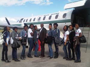 Women in front of plane (DOS)