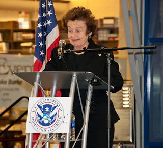 Ms. Weissmann Klein speaks about her work at the Outstanding American by Choice ceremony at the Mall of America