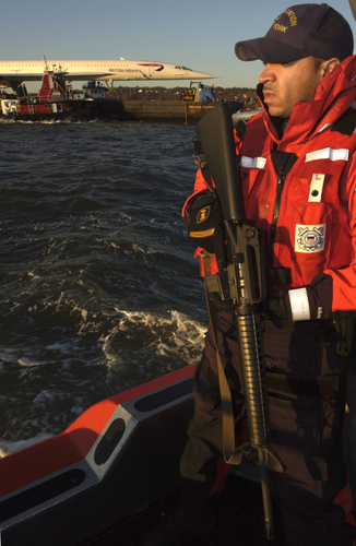 Petty Officer Carlos Perez, of Brooklyn, N.Y., conducts a homeland security patrol in New York Harbor Nov. 25, 2003. U.S. Coast Guard photo by Petty Officer 2nd Class Mike Hvozda.