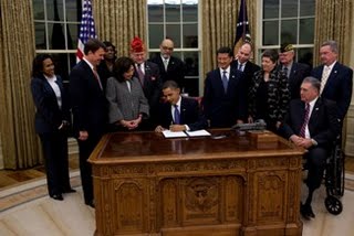President Obama signing the Executive Order establishing the Veterans Employment Initiative