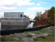 Barge Maneuvering in the Wicomico River Heading up the North Prong of the Wicomico River near the Main Street Drawbridge in Salisbury, Maryland.
