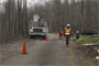 LEBANON TOWNSHIP, NJ – Ashley Kosmal, a Baltimore District project engineer, monitors a debris removal crew as they cut away fallen trees from power lines in preparation for power crews to begin to restore power to the area in the wake of Hurricane Sandy. (U.S. Army photo/Patrick Bloodgood)