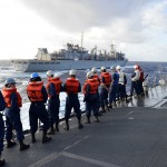 Preparing for underway replenishment with USNS Rainier