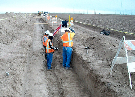 3 contractors in trench