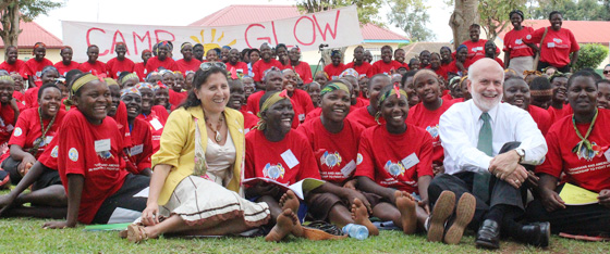 Ambassador DeLisi and Peace Corps Country Director Loucine Hayes pose with campers at the 2012 Camp GLOW event in Kisubi, Uganda.