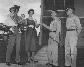 1950s family receives the key to their new Wherry-Capehart home (photo courtesy Fort Belvoir)