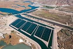 The Imperial Dam and the All-American Canal System, located in the southeastern corner of California, includes the Imperial Diversion Dam and Desilting Works, the 80-mile-long All-American Canal, the 123-mile-long Coachella Canal, and appurtenant structures. Photo by Andy Pernick, Bureau of Reclamation.